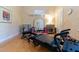 Home gym with a pilates reformer and mirrored walls at 9210 Southern Breeze Dr, Orlando, FL 32836