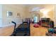 Bright home gym with pilates reformer and hardwood floors at 9210 Southern Breeze Dr, Orlando, FL 32836