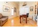 Bright home office with hardwood floors and ample natural light at 9210 Southern Breeze Dr, Orlando, FL 32836