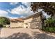 Two-story house with double garage and paver driveway at 9210 Southern Breeze Dr, Orlando, FL 32836