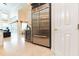 Stainless steel refrigerator and beverage cooler in kitchen at 9210 Southern Breeze Dr, Orlando, FL 32836