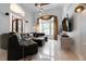 Spacious living room with sectional sofa and large windows at 9210 Southern Breeze Dr, Orlando, FL 32836