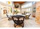 Outdoor patio with comfortable seating area at night at 9210 Southern Breeze Dr, Orlando, FL 32836