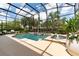 Inviting screened pool with spa and fountain features at 9210 Southern Breeze Dr, Orlando, FL 32836