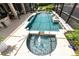 Overhead view of refreshing pool and spa at 9210 Southern Breeze Dr, Orlando, FL 32836