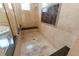 Walk-in shower with marble seat and built-in shelving at 9210 Southern Breeze Dr, Orlando, FL 32836