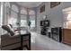 Sitting area with comfortable seating and large windows at 9210 Southern Breeze Dr, Orlando, FL 32836