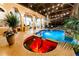 Round spa with red-lit water at night at 9210 Southern Breeze Dr, Orlando, FL 32836