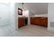 Wet bar with wooden cabinetry and a wine cooler at 9210 Southern Breeze Dr, Orlando, FL 32836