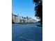 Street view of townhomes in a well-maintained neighborhood with parking available at 1322 Seven Eagles Ct # 101, Reunion, FL 34747