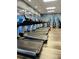 Well-equipped gym featuring modern treadmills with sleek designs for a great workout at 1322 Seven Eagles Ct # 101, Reunion, FL 34747