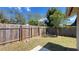 Fenced backyard area with green grass at 5317 Micco St, Kissimmee, FL 34746