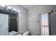Bathroom with a shower and granite vanity at 5317 Micco St, Kissimmee, FL 34746