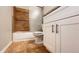 Bathroom showcasing a tiled shower, white vanity, and tiled flooring at 5317 Micco St, Kissimmee, FL 34746