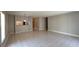 Bright and airy living area with an open view of the kitchen from the large living space at 5317 Micco St, Kissimmee, FL 34746