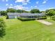 Spacious backyard with large screened in pool at 720 Shore Drive, Kissimmee, FL 34744