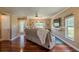 Bright living room with wood floors, neutral paint, ceiling fan and plenty of natural light at 720 Shore Drive, Kissimmee, FL 34744