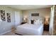 Comfortable bedroom with neutral decor and ample closet space at 1401 Hollow Creek Ln, Kissimmee, FL 34744