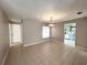 The dining room features tile flooring and seamlessly connects to the kitchen for easy access at 3180 Owassa Ct, Kissimmee, FL 34746