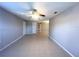 Spacious living room featuring tile flooring and neutral paint creates a bright and open atmosphere at 3180 Owassa Ct, Kissimmee, FL 34746