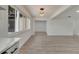 Bright dining area with wood-look floors at 4401 Marshall St, Orlando, FL 32811