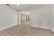 Bright dining area with wood-look flooring and views into the kitchen at 4401 Marshall St, Orlando, FL 32811