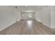 Bright and airy living room with wood-look flooring and ample natural light at 4401 Marshall St, Orlando, FL 32811