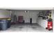 Spacious garage interior featuring ample storage space and a pristine, well-organized setup at 7139 Cedarcrest Blvd, Lakeland, FL 33810