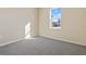 Spacious bedroom with neutral walls and grey carpeting at 914 Heirloom Dr, Haines City, FL 33844