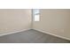 Spacious bedroom with grey carpet and neutral walls at 914 Heirloom Dr, Haines City, FL 33844