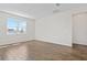 Tiled open room with a large window allowing natural light at 1635 Sugarbelle Cir, Mascotte, FL 34753