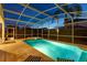 Enjoy the pool and spa at night at 730 Brunello Dr, Davenport, FL 33897