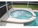 Private spa with tiled surround at 730 Brunello Dr, Davenport, FL 33897