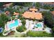 Aerial view showing resort-style pool and community amenities at 8545 Bay Lilly Loop, Kissimmee, FL 34747