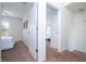 Bright hallway with doors to bedrooms at 8545 Bay Lilly Loop, Kissimmee, FL 34747