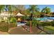 playground with play structure and swings at 8545 Bay Lilly Loop, Kissimmee, FL 34747