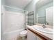 Bathroom with a tub-shower combination, vanity, and commode at 167 Bell Tower Xing W, Poinciana, FL 34759