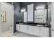 Double vanity bathroom with modern fixtures and a marble floor at 1735 Oak Blossom Dr, Davenport, FL 33837