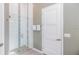 Bathroom with a walk-in shower and mosaic tile detail at 1735 Oak Blossom Dr, Davenport, FL 33837
