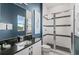 Modern bathroom with a walk-in shower and granite countertop at 1735 Oak Blossom Dr, Davenport, FL 33837
