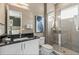 Bathroom features a large shower and dark vanity at 1735 Oak Blossom Dr, Davenport, FL 33837