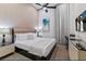 Bright bedroom with a king-size bed and a work area at 1735 Oak Blossom Dr, Davenport, FL 33837