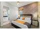 Main bedroom with a king-size bed and elegant decor at 1735 Oak Blossom Dr, Davenport, FL 33837