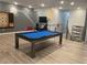 Fun game room with a pool table and game area at 1735 Oak Blossom Dr, Davenport, FL 33837