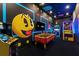 Retro game room with Pac-Personal theme and arcade games at 1735 Oak Blossom Dr, Davenport, FL 33837