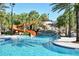 Refreshing water park with slide and waterfall at 1735 Oak Blossom Dr, Davenport, FL 33837