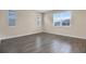 Bright bedroom with neutral walls and tile flooring at 2918 Sharp Rd, Kissimmee, FL 34744
