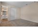 Bedroom with carpet, double door closet, and attached bath at 2918 Sharp Rd, Kissimmee, FL 34744