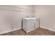 Laundry room with washer, dryer, and overhead shelving at 2918 Sharp Rd, Kissimmee, FL 34744