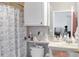 The bathroom has a shower and storage for essentials at 1100 Lake Shadow Cir # 2101, Maitland, FL 32751